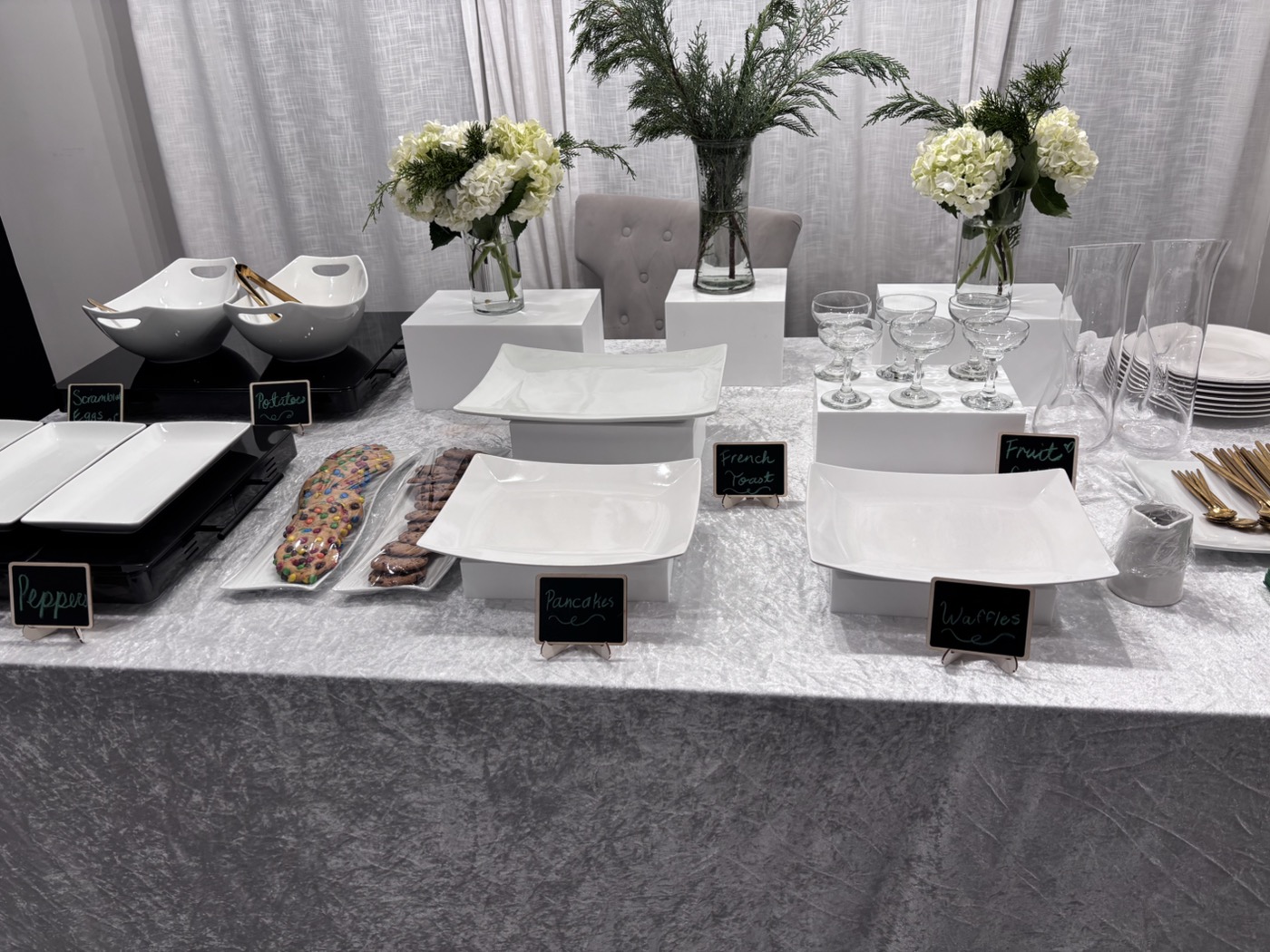 Styled catering table with florals